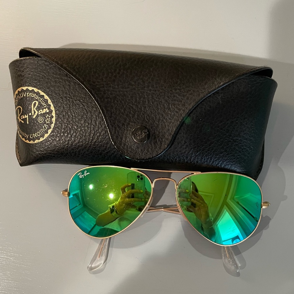 Green mirrored lens and gold framing aviator raybans